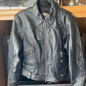 Harley Davidson leather coat, with detail stitching on the back and sleeves